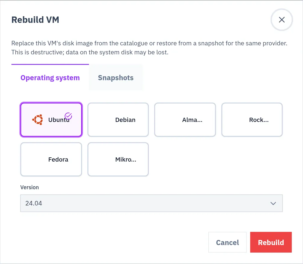 The Rebuild VM dialog on the Operating system tab with the list of systems and the Version field